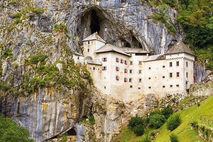 Make a day trip to Predjama Castle and Postojna Cave